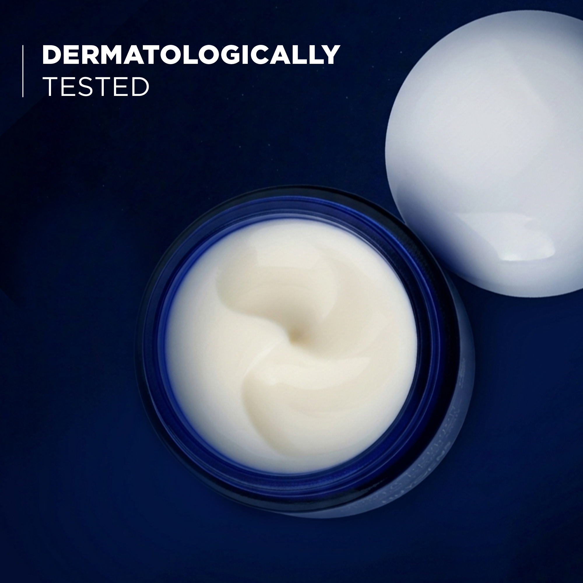 Open jar showing the cream texture, dermatologically tested